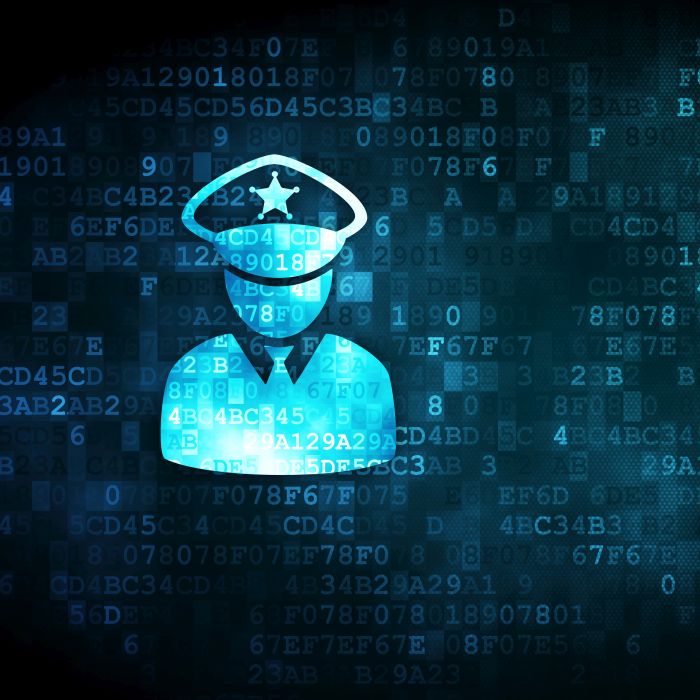 Datenschutzbeauftragter: Bild eines Sicherheitskonzepts - gepixeltes Polizei-Symbol auf digitalem Hintergrund