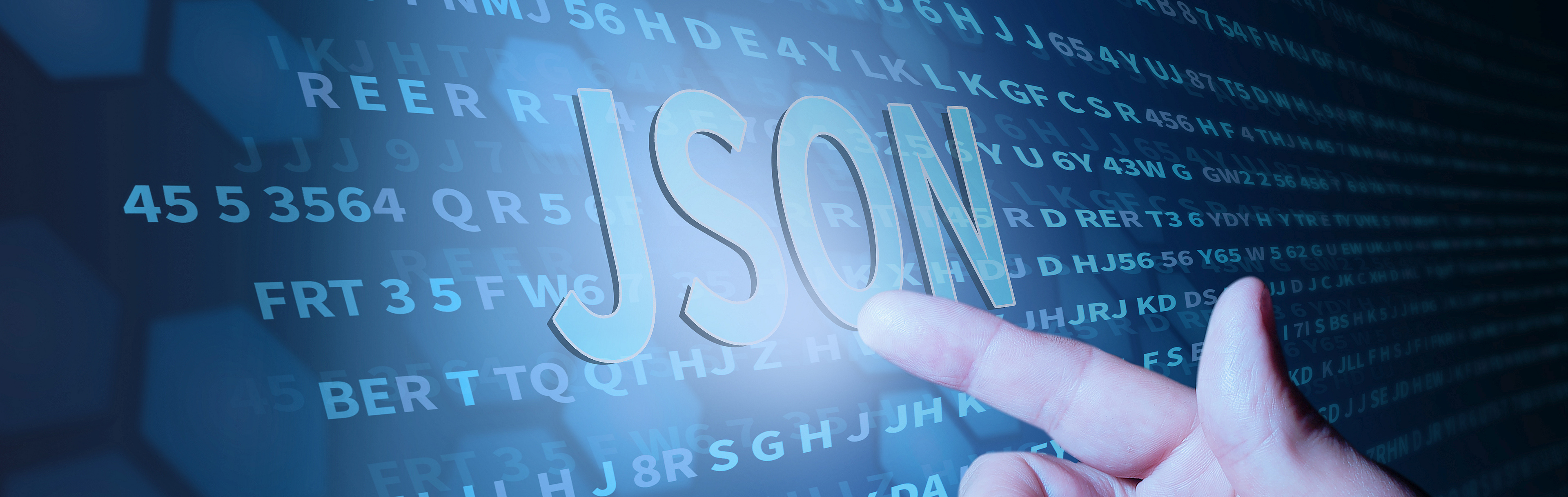 Pointing finger at the computer interface points to the term "JSON".